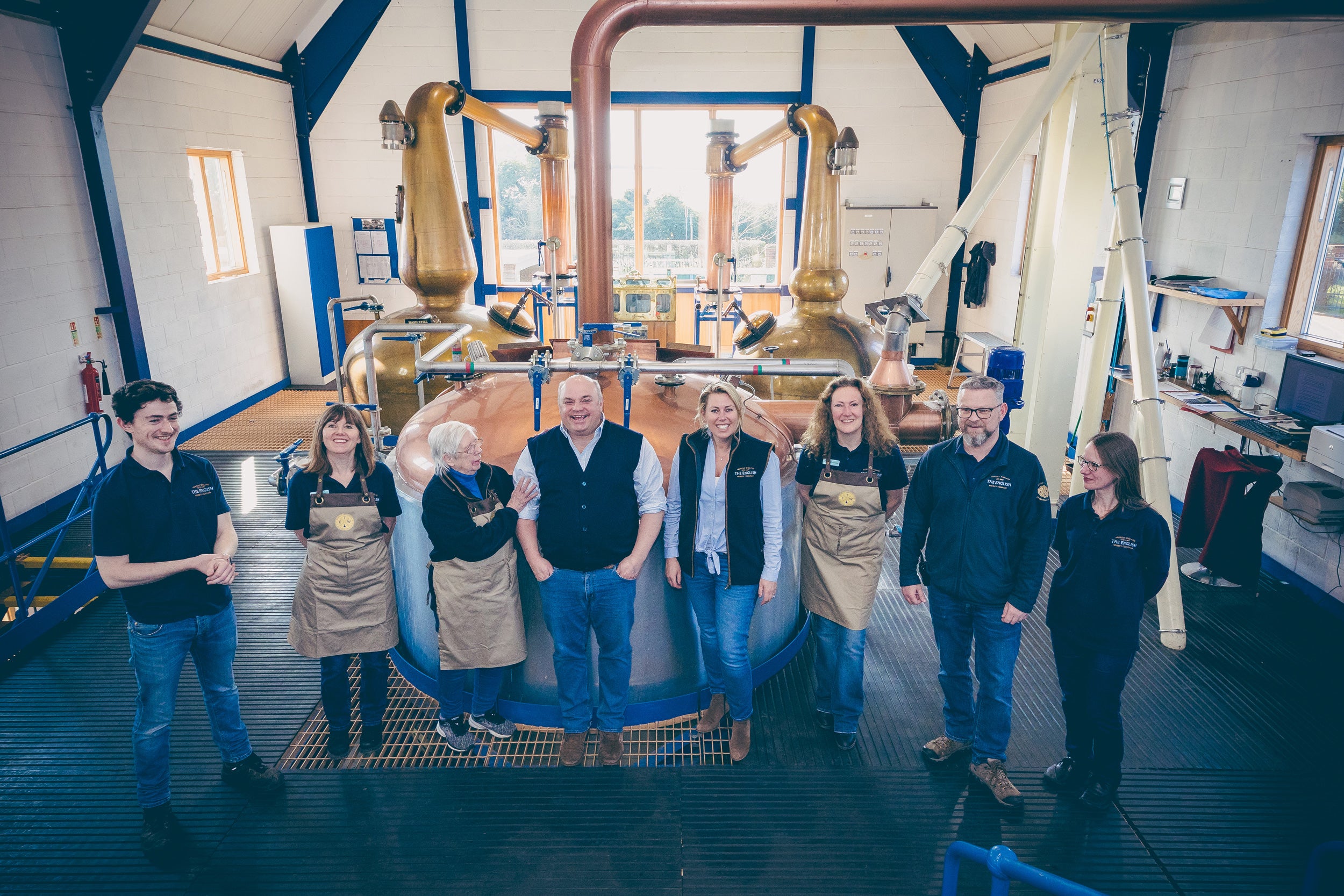 The distillery team with Andrew and Katy Nelstrop on the distilling floor